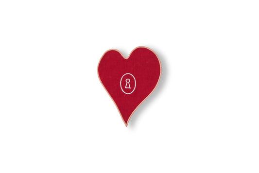 Red heart-shaped coaster